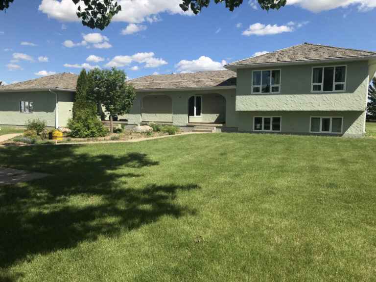 mossy green farmhouse stucco